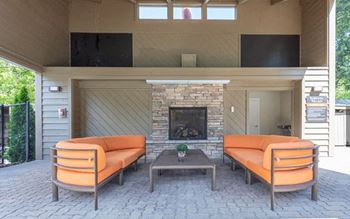 Covered pool lounge with fireplace